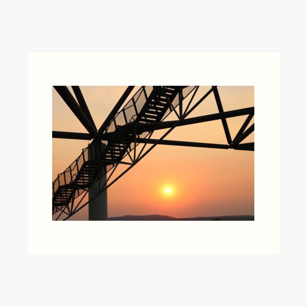 Item preview, Sunset behind steel construction – industrial art meets nature designed and sold by Kriw3ey.