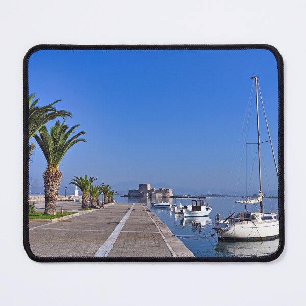 Item preview, Small white fishing boats and Bourtzi fortress in Nafplio, Peloponnese, Greece designed and sold by goceris.