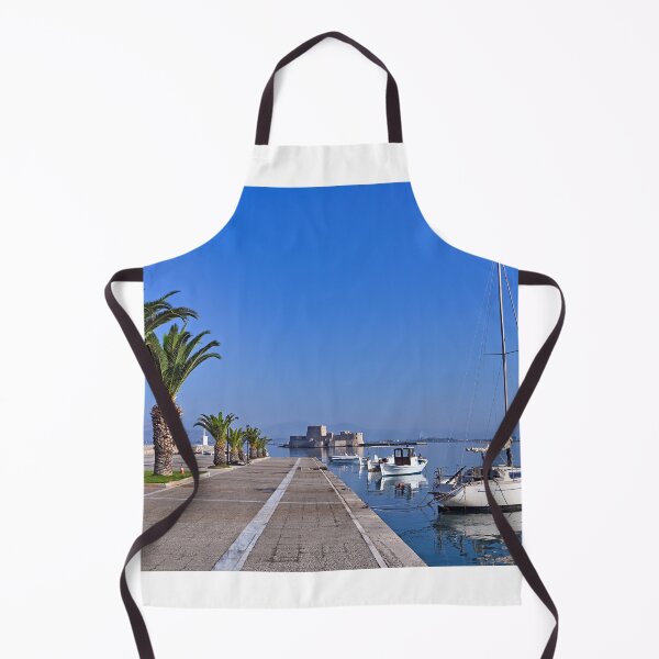 Item preview, Small white fishing boats and Bourtzi fortress in Nafplio, Peloponnese, Greece designed and sold by goceris.