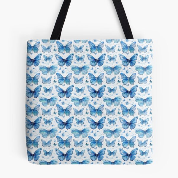Aperçu de l'œuvre papillons aquarelles bleus monochromes créée et vendue par PoppyLaneStudio.