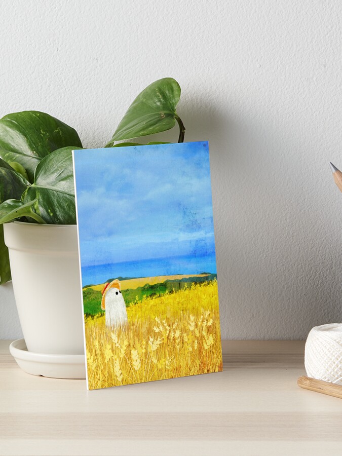 Thumbnail 1 of 2, Art Board Print, There's a Ghost in the Wheat Field designed and sold by katherineblower.