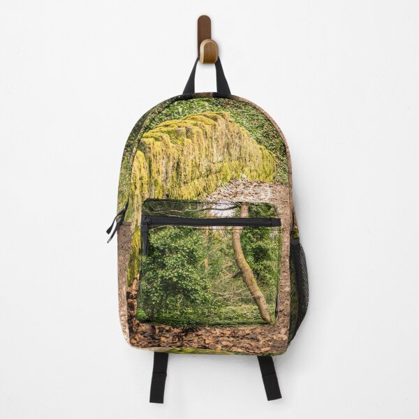 Item preview, moss-covered stone bridge leading to a tunnel in a lush, green forest, designed and sold by David Patterson.