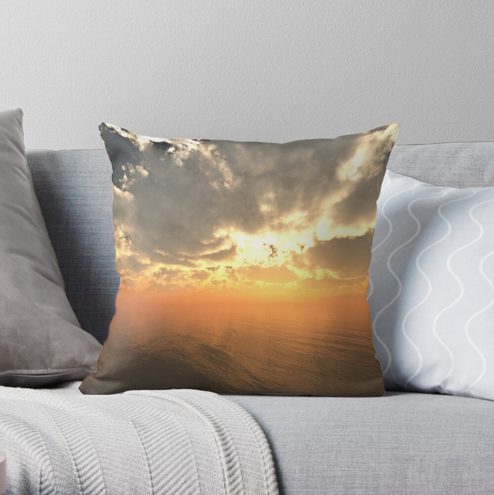 Cloudy Sunrise Over Water Throw Pillow