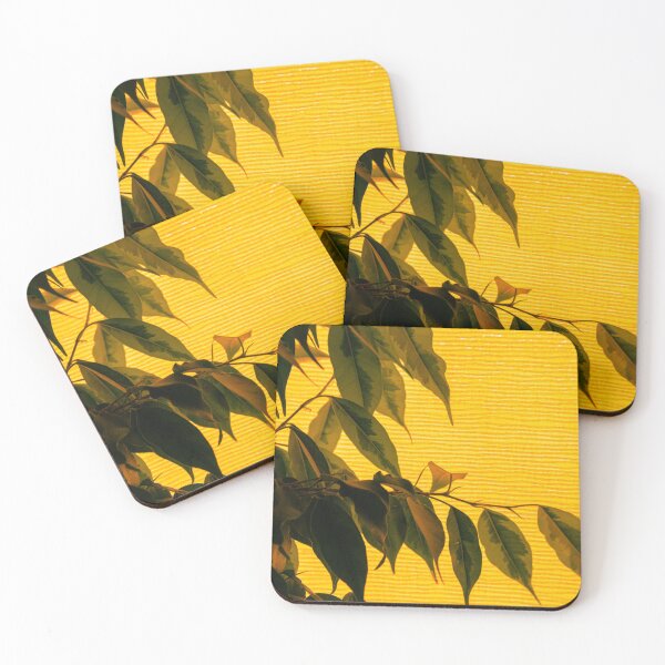 Item preview, A tree branch with green leaves on a bright yellow background designed and sold by EirinDesign.