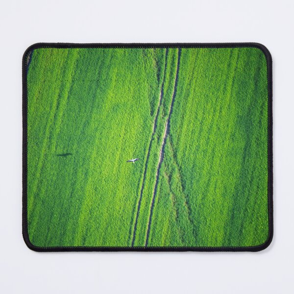 Item preview, A stork flies over a green meadow. designed and sold by christosgr.