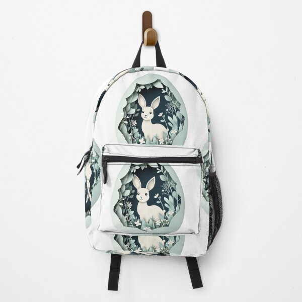 Item preview, Delicate paper art showcases a white rabbit amid green foliage and flowers inside a stylized egg. designed and sold by olenapetol.