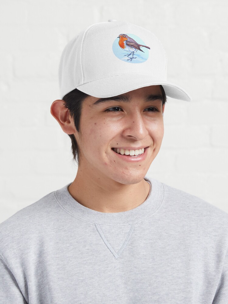 Aperçu 3 sur 7. Casquette avec l'œuvre Illustration aquarelle du petit rouge-gorge effronté créée et vendue par InkySwallows.