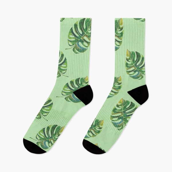 Item preview, Swiss cheese plant leaves on a light green background. designed and sold by claireseyeview.