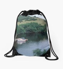 Our boat moored at Pier of Urquhart Castle Urquhart Bay Loch Ness Scotland 19840910 0005 Drawstring Bag