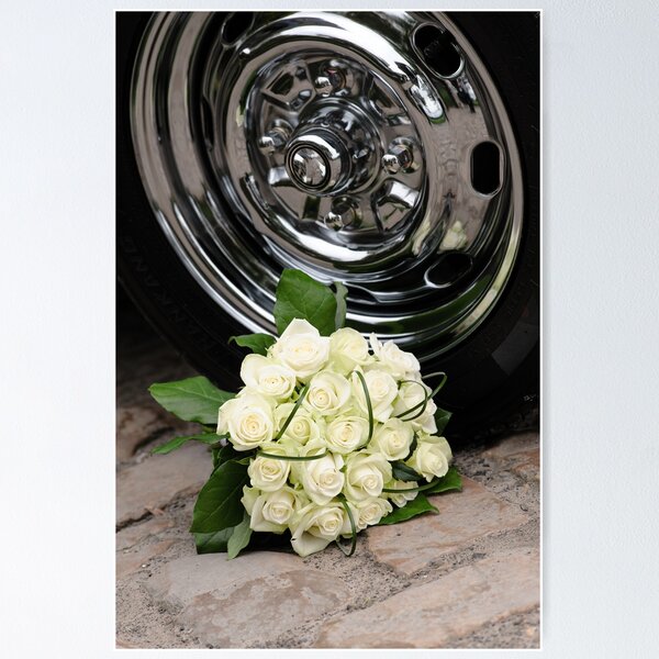 Item preview, Elegant White Rose Bouquet Beside Polished Chrome Wheel Rim on Stone Pavement designed and sold by FotoMahieu.