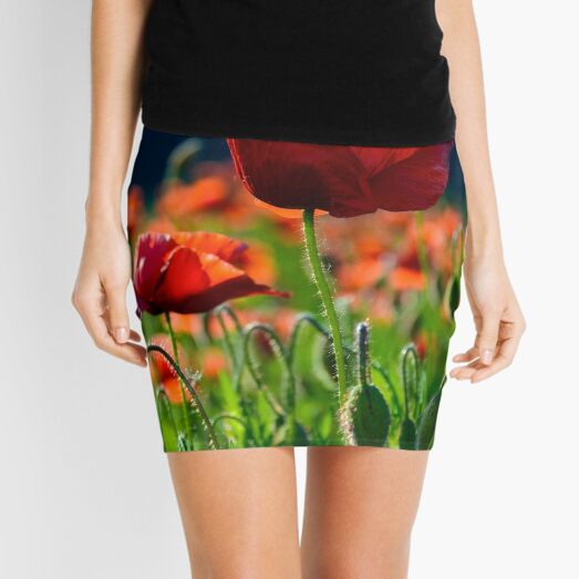 big red blossoming poppy flower in the field Mini Skirt