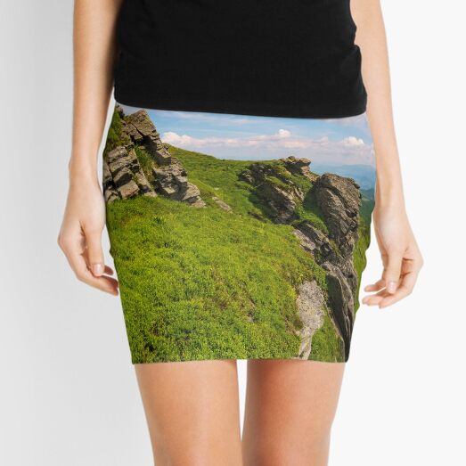 grassy hillside with boulders Mini Skirt