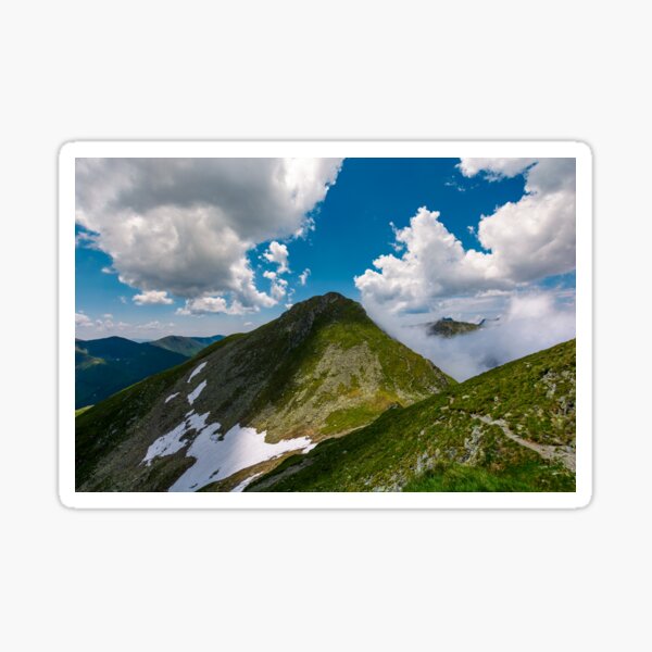 Peaks of mountain ridge among the clouds Sticker