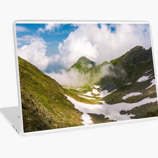 mountain ridge among the clouds Laptop Skin