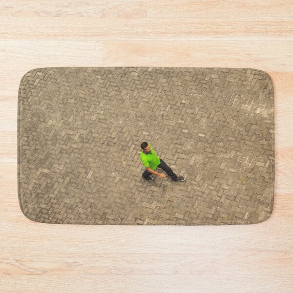 Item preview, man in green shirt walking in the square designed and sold by felipequeiroz.