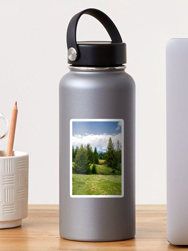 Thumbnail 1 of 3, Sticker, spruce forest on rolling hills designed and sold by mike-pellinni.