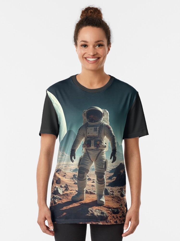 Thumbnail 2 of 5, Graphic T-Shirt, Astronaut exploring a Planet designed and sold by LenCarol.