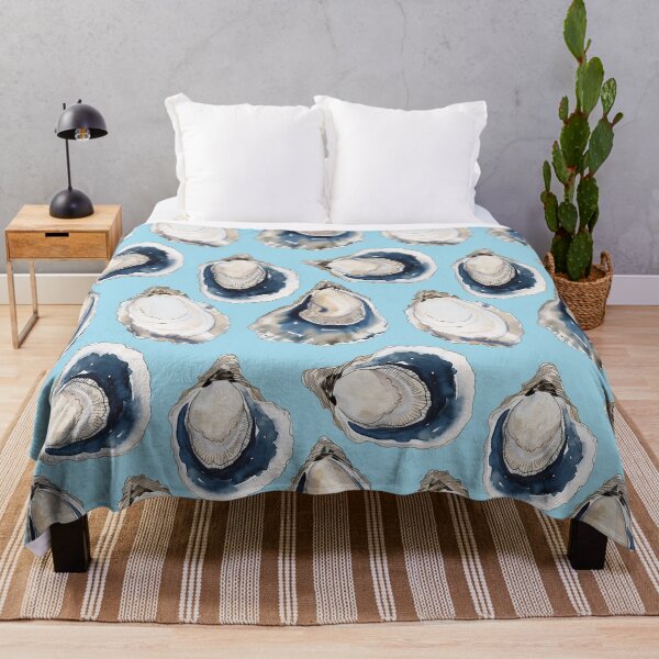 Vista previa del artículo con la obra «Patrón de concha de ostra con temática costera y fondo azul claro», diseñado y vendido por GnosisCollage.