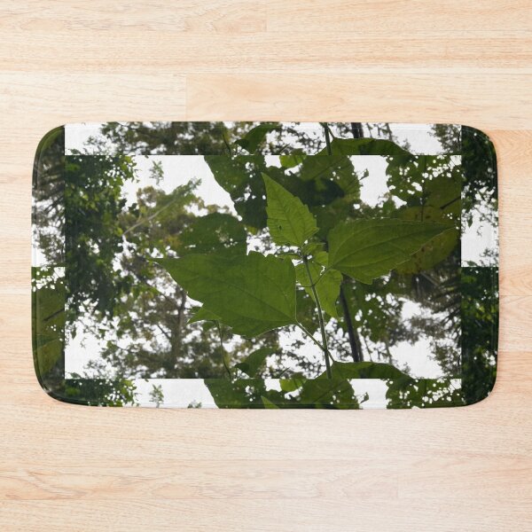 Item preview, Low angle view of plant leaves on the mountain designed and sold by Yusuf-Design.