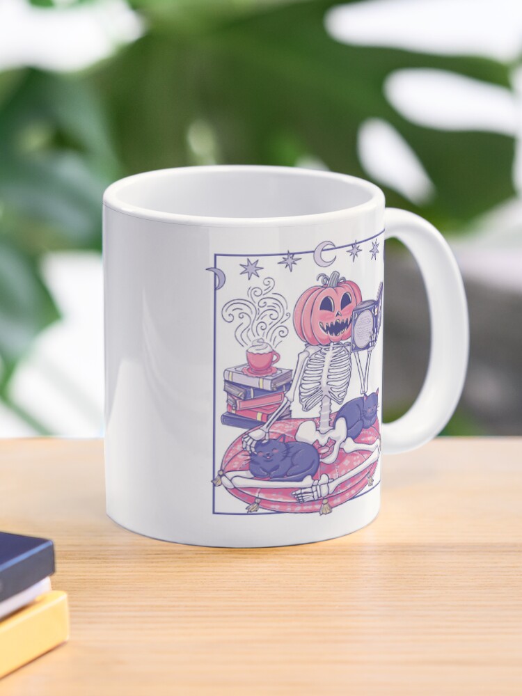 Thumbnail 1 of 6, Coffee Mug, Cute Pumpkin-Head Skeleton Reading With Cats designed and sold by StudioFloraLuna.