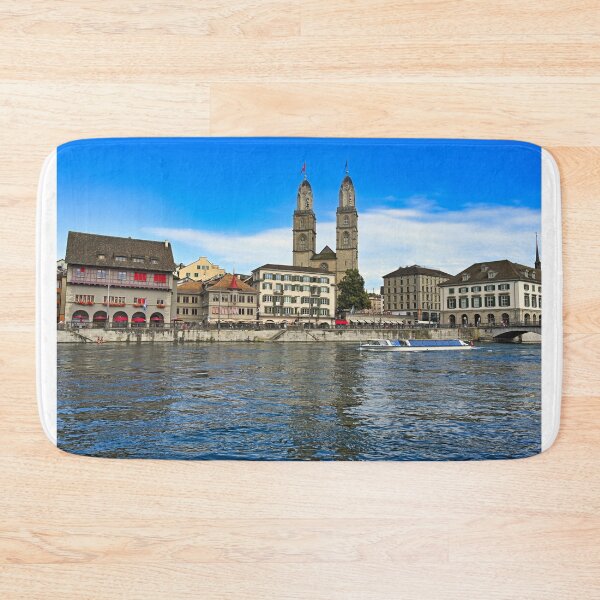 Item preview, Historic Zurich city center with Grossmunster churh and a tourist boat sails on the river Limmat, Switzerland designed and sold by goceris.