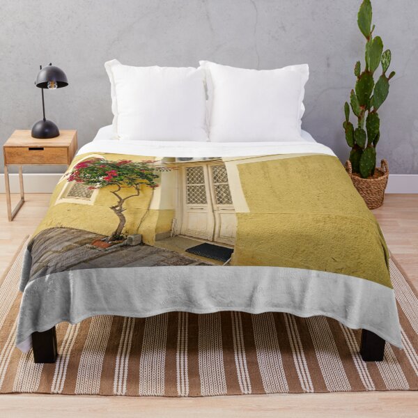 Item preview, Old house yellow wall and Bougainvillea flowers,Nafplio,Greece designed and sold by goceris.