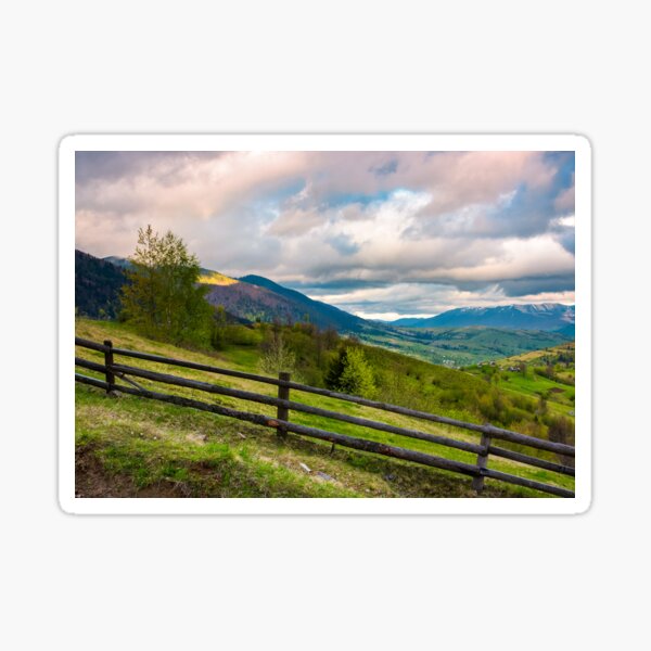 wooden fence across the hill Sticker