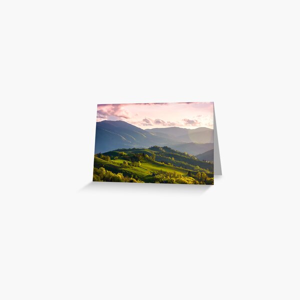 colorful sunset in Carpathian countryside Greeting Card