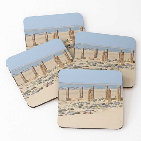 Item preview, Row of wooden groynes nestled in a sandy beach of Braunton sands in Devon England designed and sold by NJCArtPhoto.