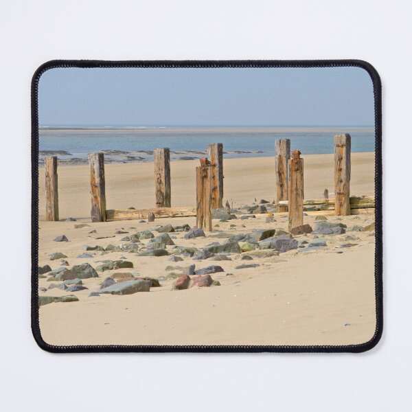 Item preview, Row of wooden groynes nestled in a sandy beach of Braunton sands in Devon England designed and sold by NJCArtPhoto.
