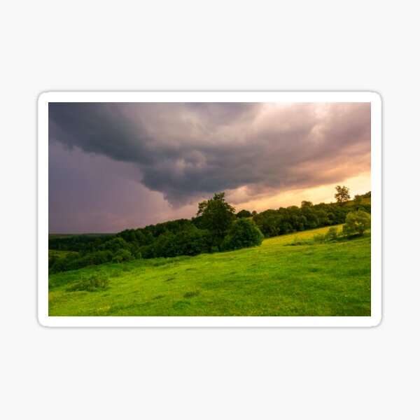 beautiful countryside on a cloudy sunset Sticker
