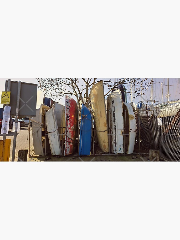 Thumbnail 3 of 3, Art Print, Dry Stack at the Creek boat hulls along the UK coast by Blink Friction designed and sold by taletellerclub.