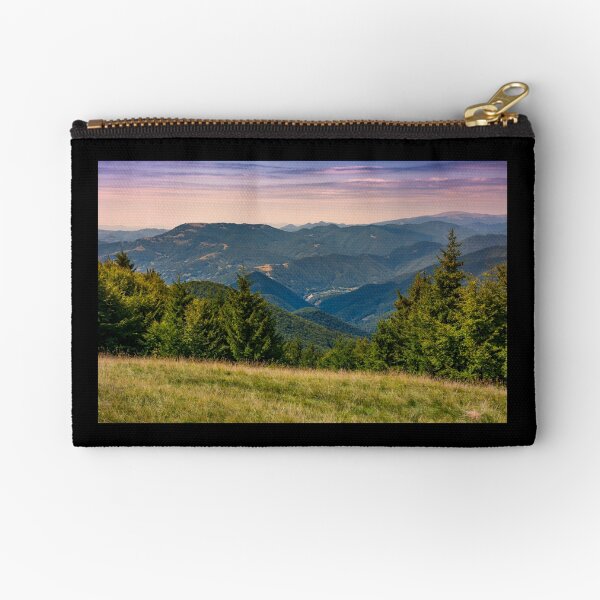 forested hills over the Brustury valley at sunset Zipper Pouch
