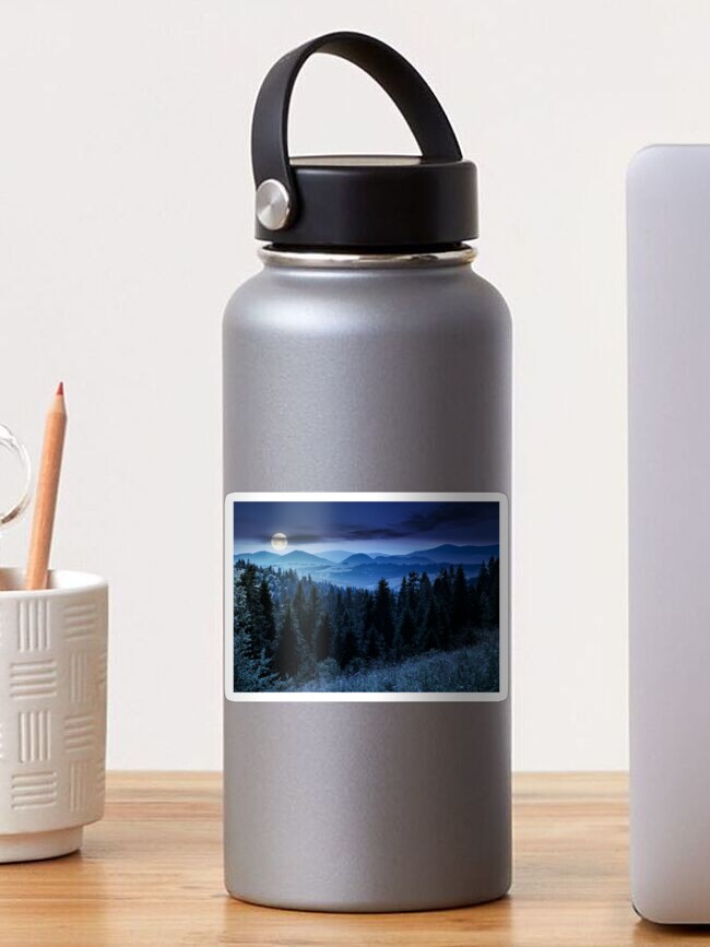 Thumbnail 1 of 3, Sticker, spruce forest in mountains at night designed and sold by mike-pellinni.