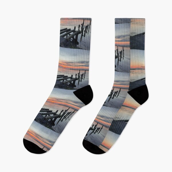 Item preview, Art by Mike Photography Photo of a rocky path on the beach. Pier leading into the sea. designed and sold by allartbymike.