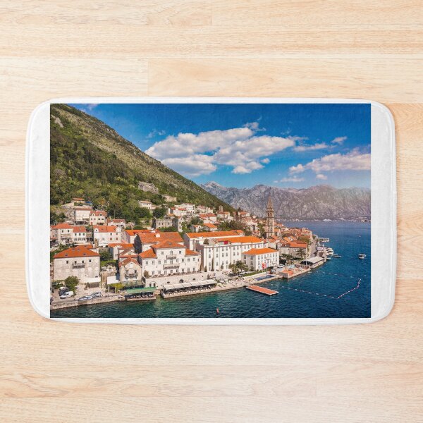 Item preview, View of the historic town of Perast at famous Bay of Kotor on a beautiful sunny day with blue sky and clouds in summer, Montenegro. Historic city of Perast at Bay of Kotor in summer, Montenegro. designed and sold by Framed Horizons.