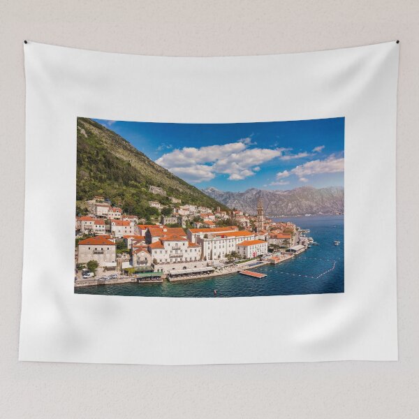 Item preview, View of the historic town of Perast at famous Bay of Kotor on a beautiful sunny day with blue sky and clouds in summer, Montenegro. Historic city of Perast at Bay of Kotor in summer, Montenegro. designed and sold by Framed Horizons.