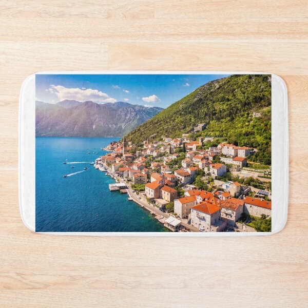 Item preview, View of the historic town of Perast at famous Bay of Kotor on a beautiful sunny day with blue sky and clouds in summer, Montenegro. Historic city of Perast at Bay of Kotor in summer, Montenegro. designed and sold by Framed Horizons.