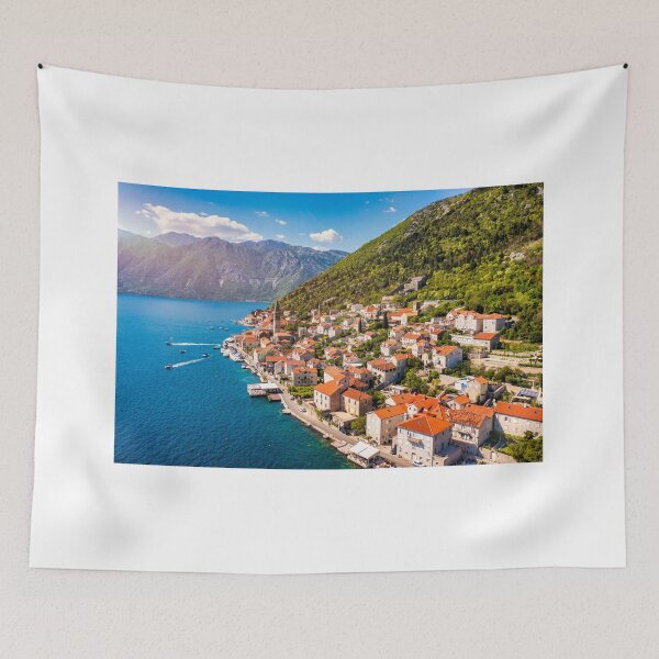 Item preview, View of the historic town of Perast at famous Bay of Kotor on a beautiful sunny day with blue sky and clouds in summer, Montenegro. Historic city of Perast at Bay of Kotor in summer, Montenegro. designed and sold by Framed Horizons.