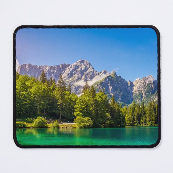 Item preview, Picturesque lake Lago Fusine in Italy. Fusine lake with Mangart peak on background. Popular travel destination of Julian Alps. Location: Tarvisio comune , Province of Udine, Italy, Europe. designed and sold by Framed Horizons.