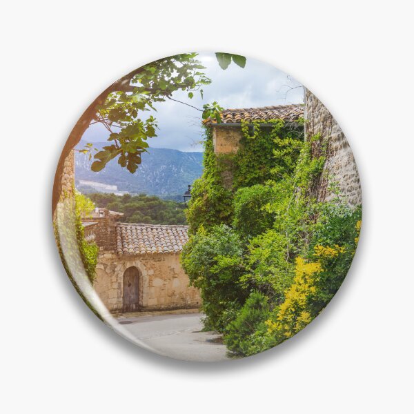 Item preview, Charming street in quaint Menerbes village with colorful buildings and vibrant flowers. Village of Menerbes (Most Beautiful Village in France) in the Luberon mountains, France, Luberon, Vaucluse. designed and sold by Framed Horizons.
