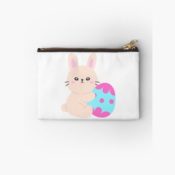 Aperçu de l'œuvre Lapin de Pâques tenant un œuf décoré bleu et rose – Illustration kawaii de lapin assis créée et vendue par BubiStudio.