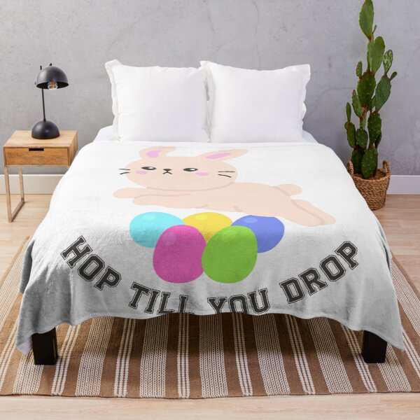 Item preview, Energetic Easter Bunny Jumping Over Eggs – Hop Till You Drop Sticker designed and sold by BubiStudio.