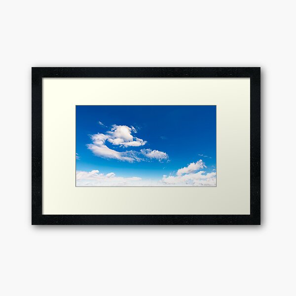 amazing cloud formations on a blue sky Framed Art Print