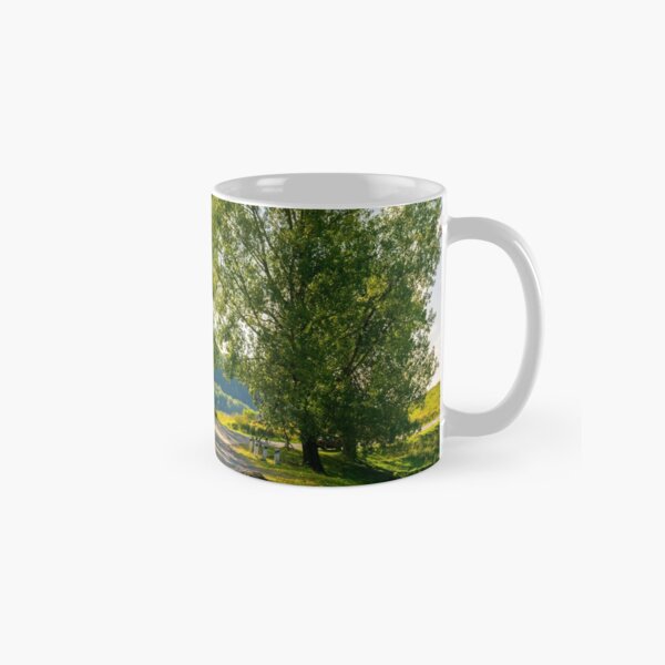 trees by the serpentine road in mountains Classic Mug