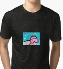 A little girl swims down under at the bottom of the pool Tri-blend T-Shirt