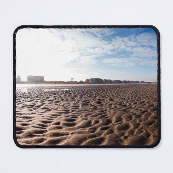 Item preview, Vast Sandy Beach With City Skyline Under Clear Blue Sky designed and sold by FotoMahieu.