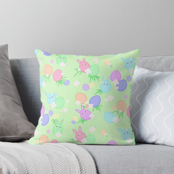 Item preview, Pastel colored Easter eggs with white flowers, grass and Easter bunnies on a green background designed and sold by katecheerycake.