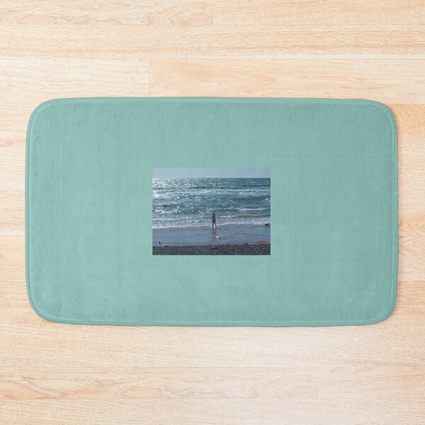 Item preview, BEACHCOMBER PADDLING IN CORNWALL IN SPARKLING SEA designed and sold by Richard Brookes Photography.