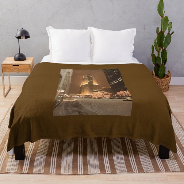 Item preview, Snowfall in the Loop – Nighttime Lights and Art Deco Skyline in Sepia Colors designed and sold by Maryna Gumenyuk.